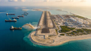 By dumping tonnes of sand into the ocean for 12 years